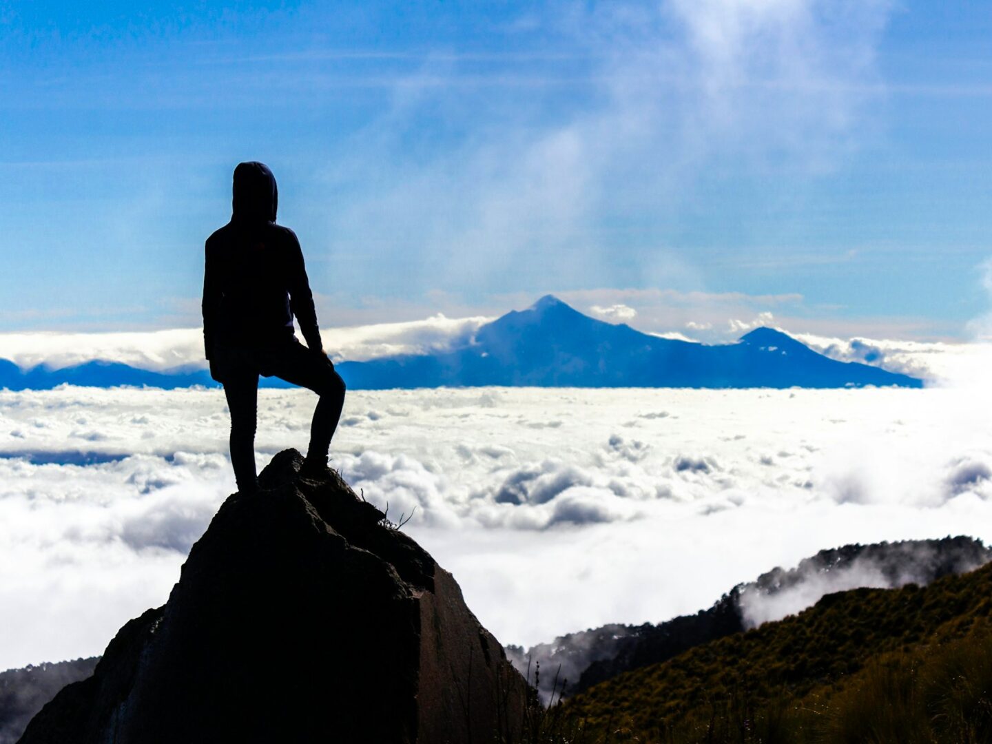 Person standing on a cliff